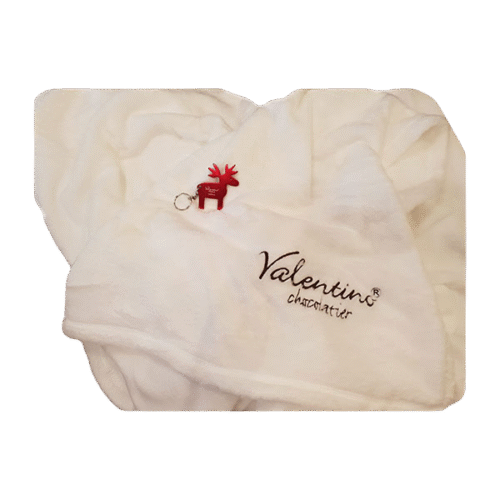 Бяло пухкаво одеяло на звездички от Valentino Chocolatier България. Продукти от истински белгийски шоколад.